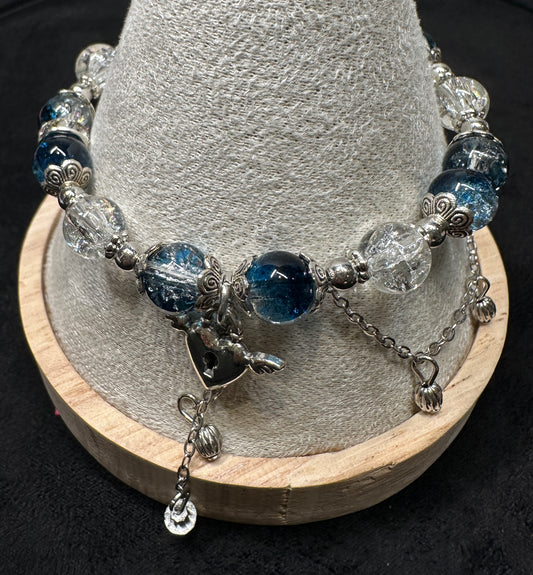 Skyward Serenade Bracelet | Winged Heart & Floral Bead Cap