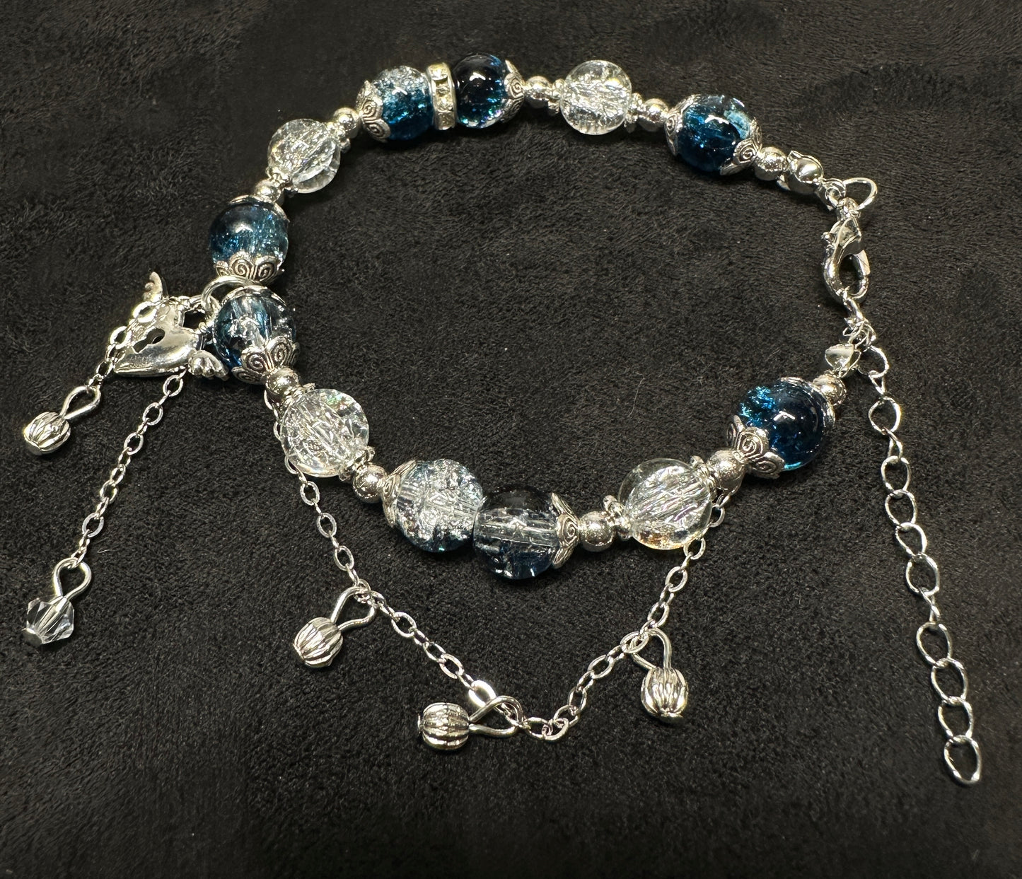 Skyward Serenade Bracelet | Winged Heart & Floral Bead Cap