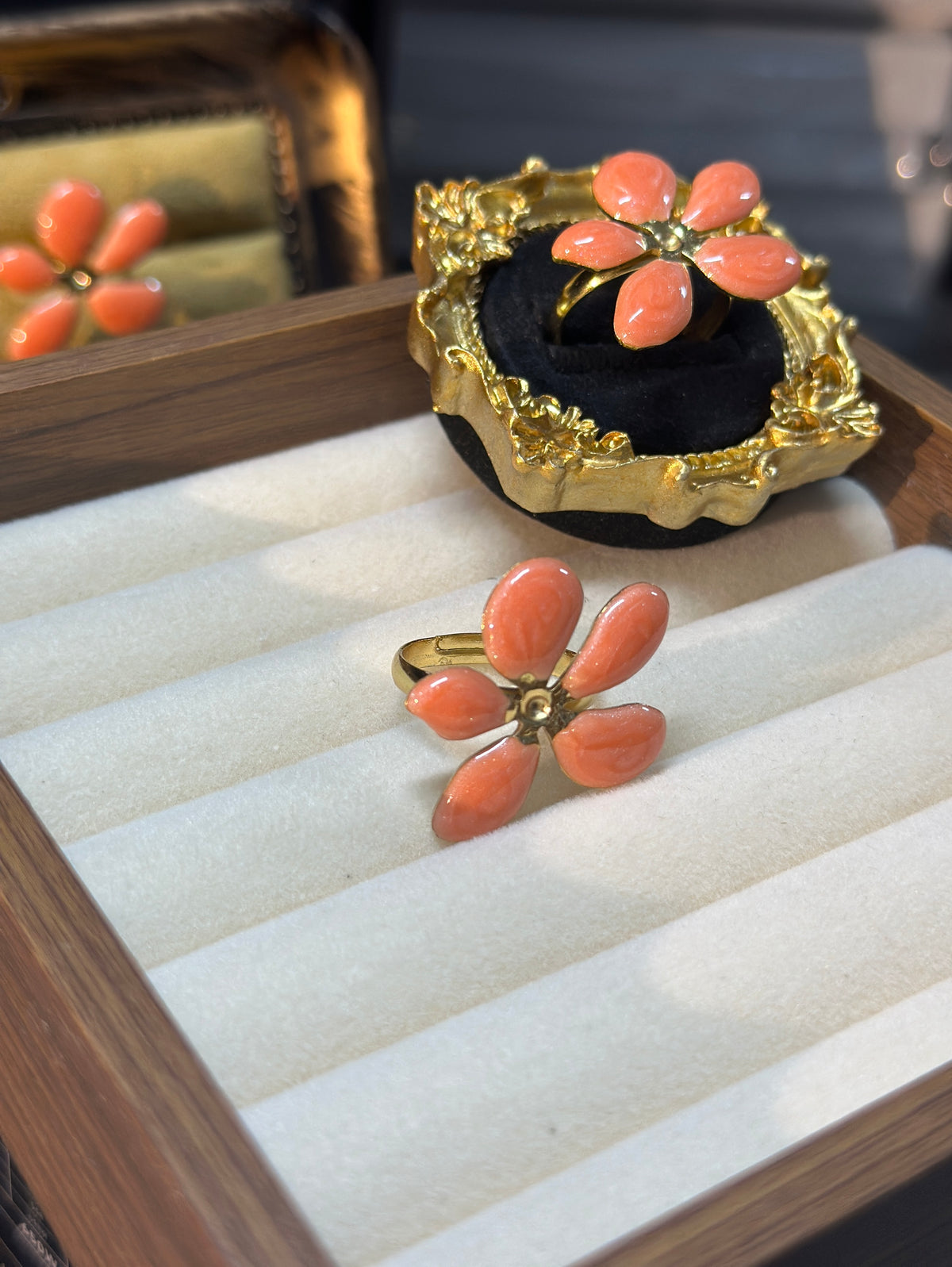 Orange-pink five-petal flower adjustable ring with irregular petals and gold-tone centre