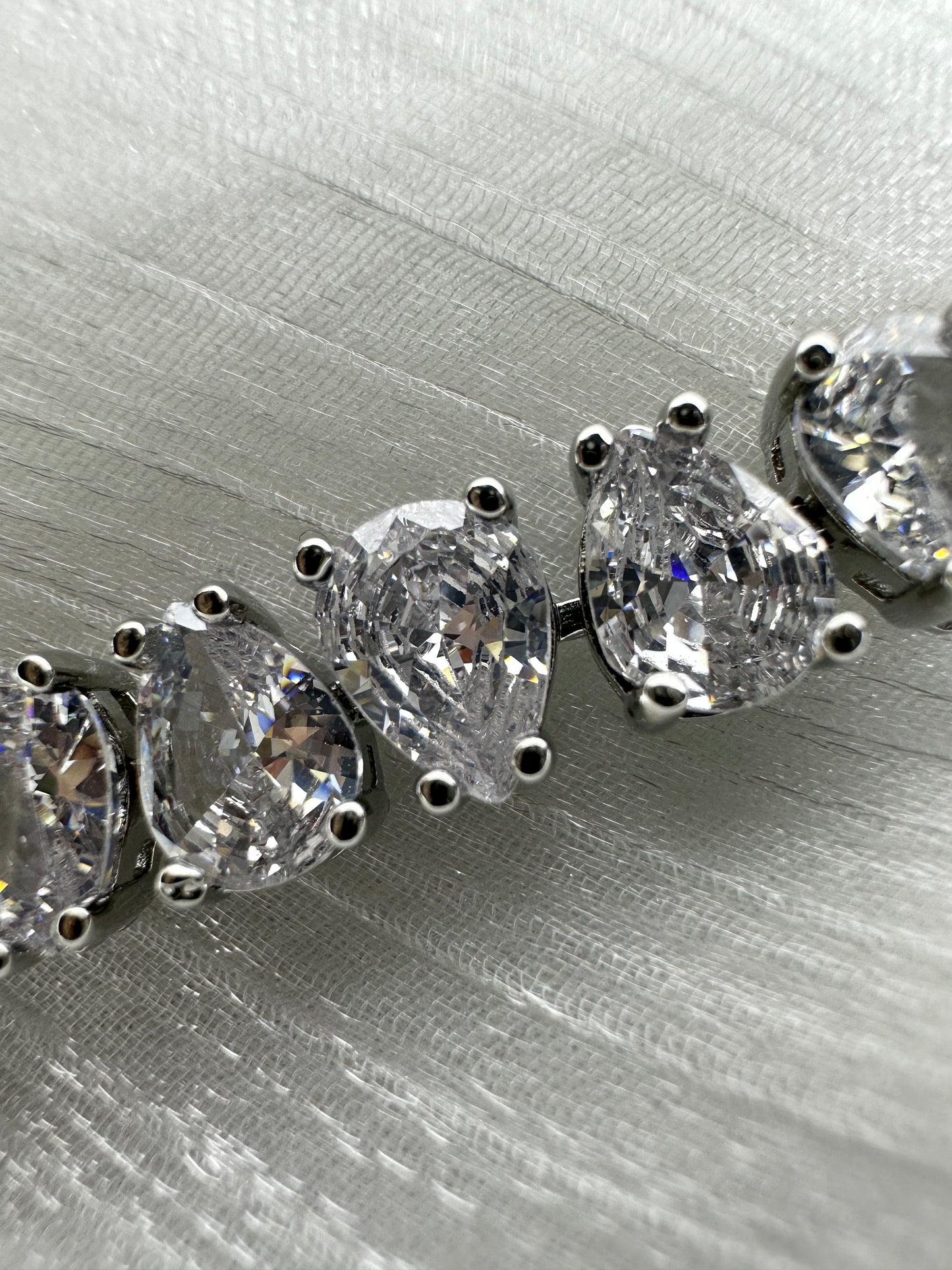 Elegant Pear Cut Cubic Zirconia Tennis Bracelet | Premium Platinum-Plated Brass, Adjustable 16.5cm - 17.5cm Length