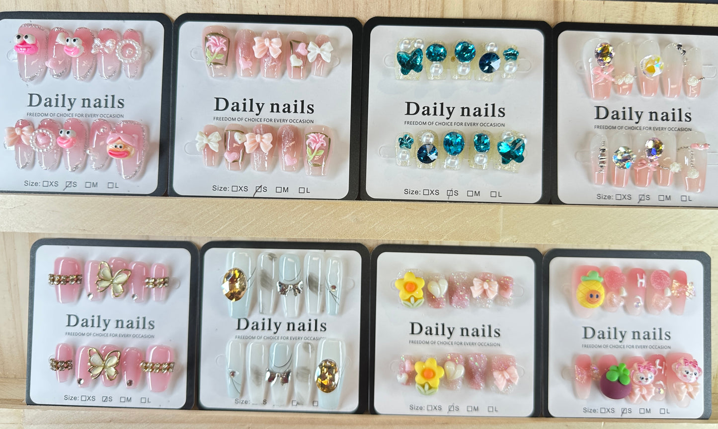 Unbox the Magic! 10 Unique, Handcrafted Nail Sets Await.