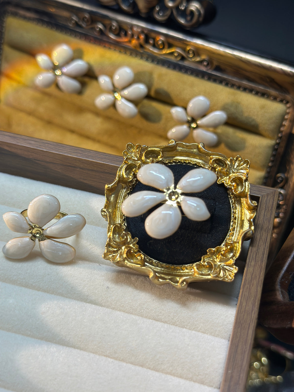 Ivory white five-petal flower adjustable ring with glossy irregular petals and gold-tone centre