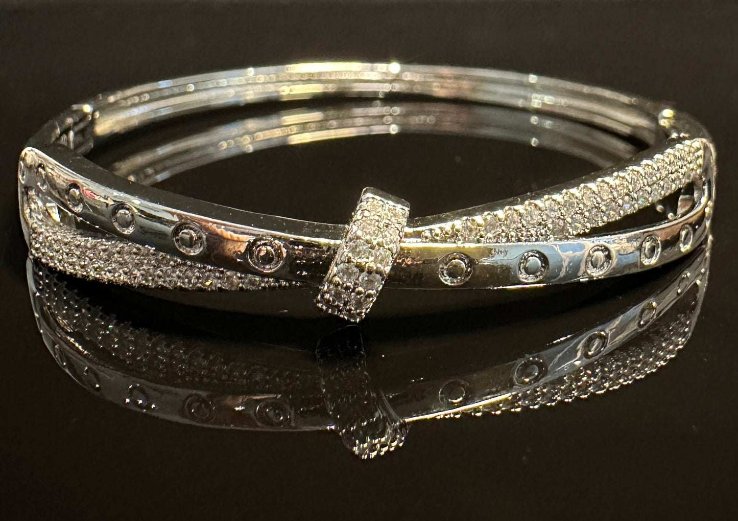 Locus Cross Bangle | Geometric Bow Design in Silver Tone