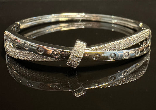 Locus Cross Bangle | Geometric Bow Design in Silver Tone