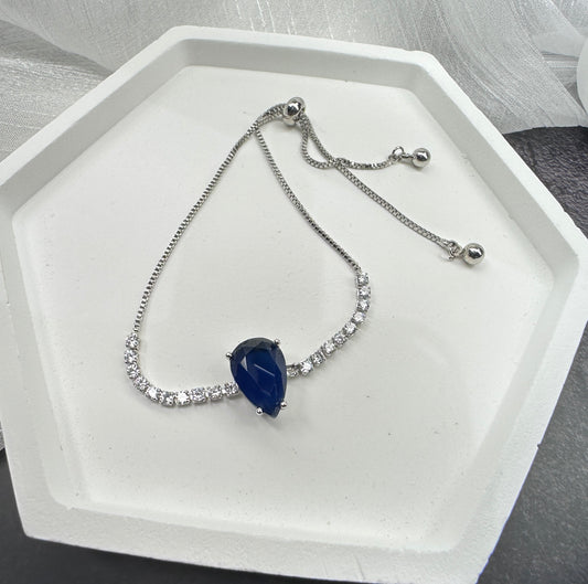 Deep Sea Solitaire: Pear-cut Radiant Stone Adjustable Bracelet