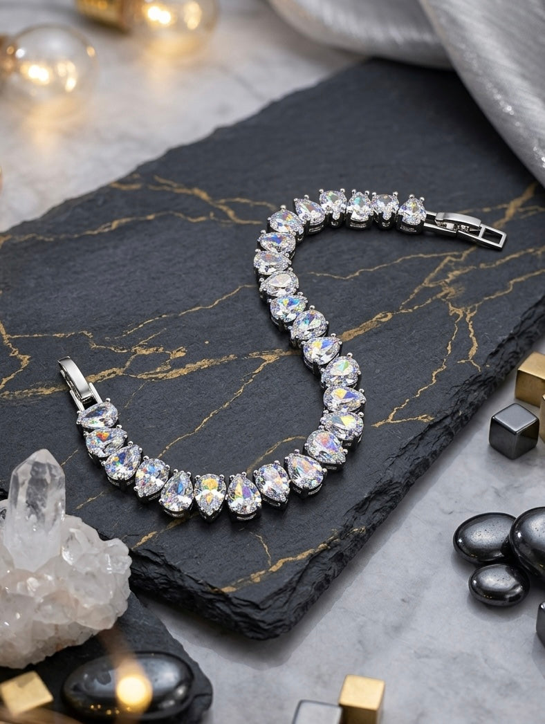 Elegant Pear Cut Cubic Zirconia Tennis Bracelet | Premium Platinum-Plated Brass, Adjustable 16.5cm - 17.5cm Length