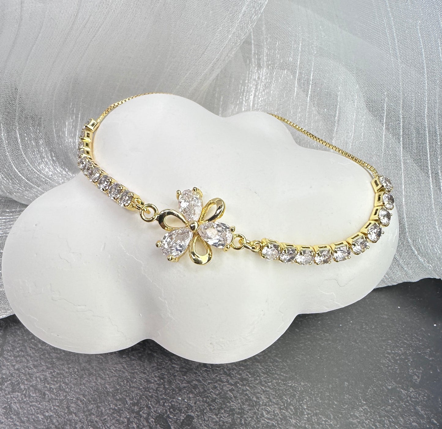 Meadow Whisper: Four-Petal Flower Adjustable Radiant Bracelet