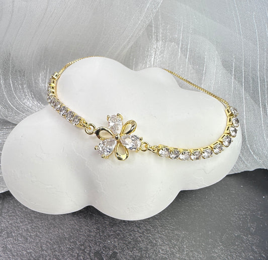 Meadow Whisper: Four-Petal Flower Adjustable Radiant Bracelet