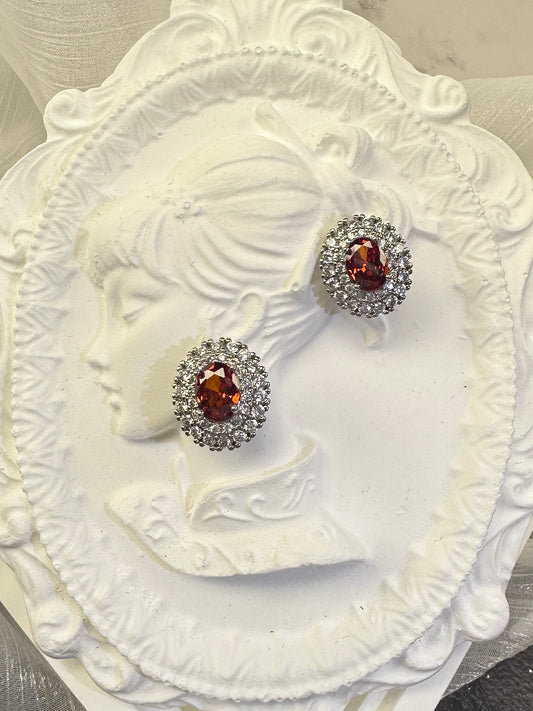 Majestic Sunset Garnet Oval-Cut Double Halo Stud Earrings