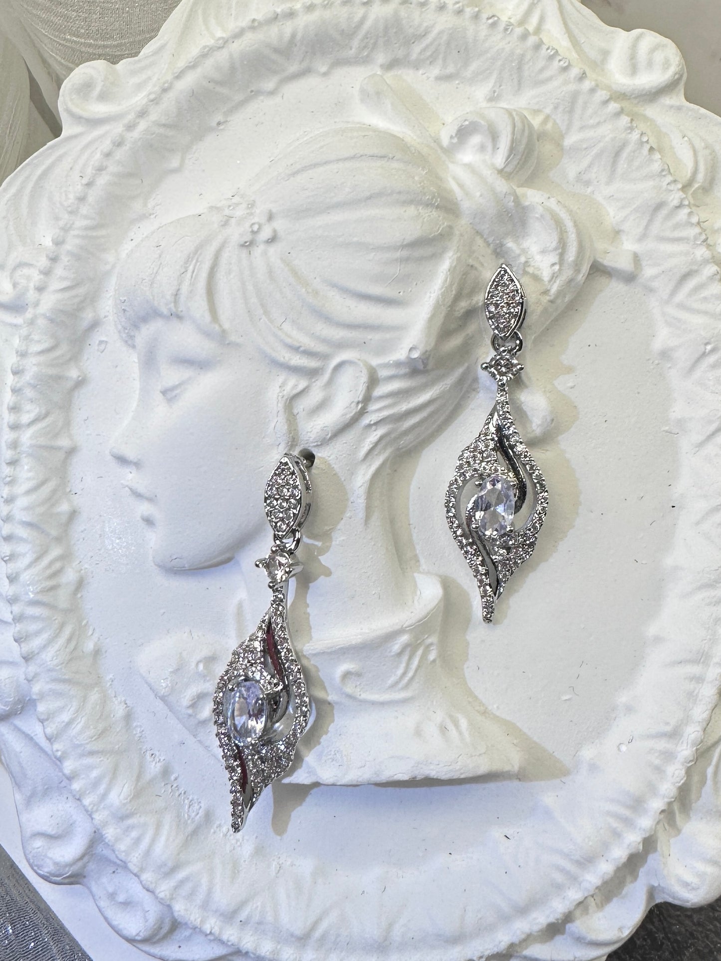 Brilliant Icy White Intertwined Teardrop Oval-Cut Drop Earrings